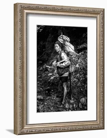 Black and white picture of a Sherpa carrying meat up to Everest Base Camp in Nepal-David Chang-Framed Photographic Print