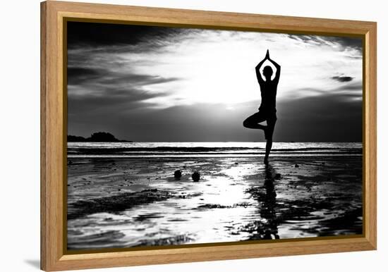 Black And White Picture: Young Woman Practicing Yoga On The Beach At Sunset-De Visu-Framed Stretched Canvas