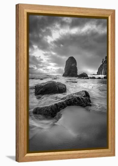Black and white vertical of swirling water around rocks on a beach-Sheila Haddad-Framed Premier Image Canvas