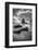 Black and white vertical of swirling water around rocks on a beach-Sheila Haddad-Framed Photographic Print