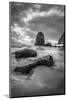 Black and white vertical of swirling water around rocks on a beach-Sheila Haddad-Mounted Photographic Print