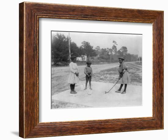 Black Children Playing Golf Photograph-Lantern Press-Framed Art Print