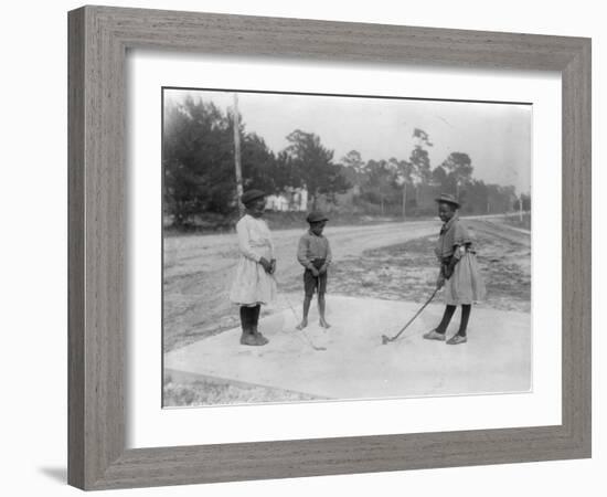 Black Children Playing Golf Photograph-Lantern Press-Framed Art Print