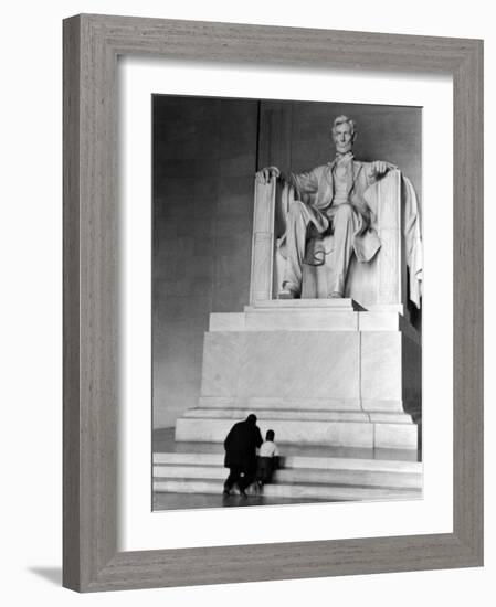 Black Man and Small Boy Kneeling Prayerfully on Steps on Front of Statue in the Lincoln Memorial-Thomas D^ Mcavoy-Framed Photographic Print