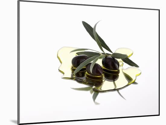 Black Olives and Olive Sprig in Olive Oil-Karl Newedel-Mounted Photographic Print