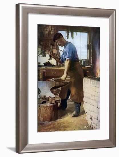 Blacksmith at Work, England, C1922-Sidney H Nicholls-Framed Giclee Print