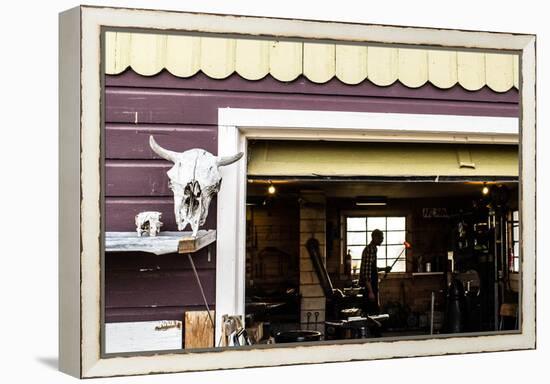 Blacksmith Carries Hot Iron Across His Workshop Towards A Power-Hammer-Hannah Dewey-Framed Premier Image Canvas