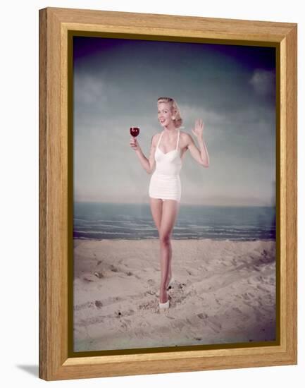 Blonde Pin-Up on Beach-Charles Woof-Framed Premier Image Canvas