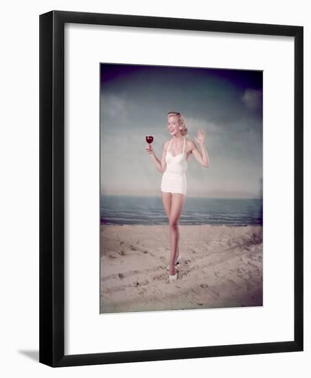 Blonde Pin-Up on Beach-Charles Woof-Framed Photographic Print