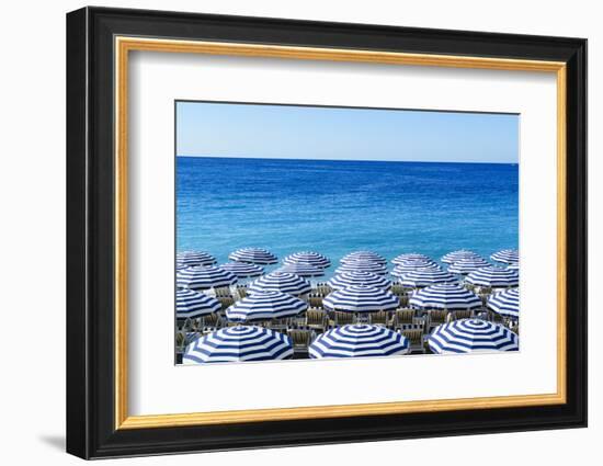 Blue and white beach parasols, Nice, Alpes Maritimes, Cote d'Azur, Provence, France, Mediterranean,-Fraser Hall-Framed Photographic Print