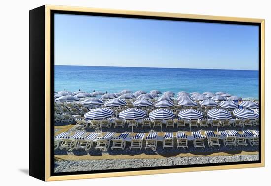 Blue and white beach parasols, Nice, Alpes-Maritimes, Cote d'Azur, Provence, French Riviera, France-Fraser Hall-Framed Premier Image Canvas