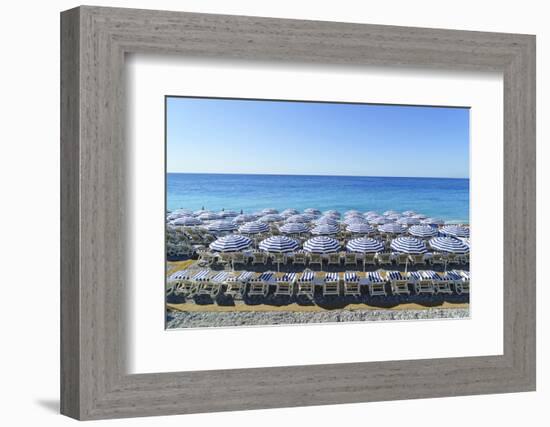 Blue and white beach parasols, Nice, Alpes-Maritimes, Cote d'Azur, Provence, French Riviera, France-Fraser Hall-Framed Photographic Print