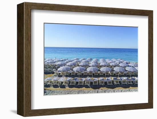 Blue and white beach parasols, Nice, Alpes-Maritimes, Cote d'Azur, Provence, French Riviera, France-Fraser Hall-Framed Photographic Print