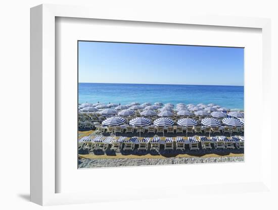 Blue and white beach parasols, Nice, Alpes-Maritimes, Cote d'Azur, Provence, French Riviera, France-Fraser Hall-Framed Photographic Print