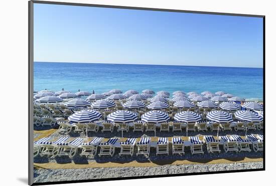 Blue and white beach parasols, Nice, Alpes-Maritimes, Cote d'Azur, Provence, French Riviera, France-Fraser Hall-Mounted Photographic Print