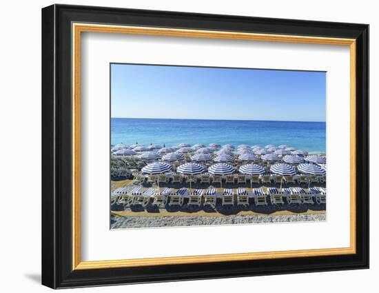 Blue and white beach parasols, Nice, Alpes-Maritimes, Cote d'Azur, Provence, French Riviera, France-Fraser Hall-Framed Photographic Print