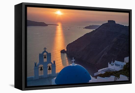 Blue dome church and famous three bells with cross and steeple in Fira, Santorini, Greece.-Michele Niles-Framed Premier Image Canvas