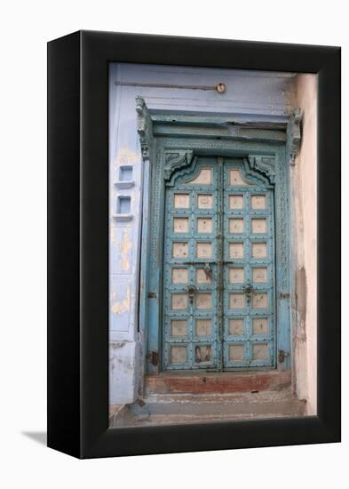 Blue-painted door, Jojawar, Rajasthan, India.-Inger Hogstrom-Framed Premier Image Canvas