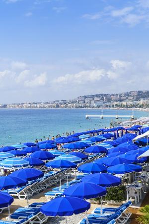Blue parasols on the beach, Promenade des Anglais, Nice, Alpes Maritimes,  Cote d'Azur, Provence, Fr' Photographic Print - Fraser Hall | Art.com