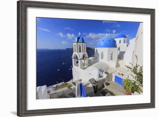 Blue Roofed Churches and Homes are Everywhere on the Island. Santorini. Greece-Tom Norring-Framed Photographic Print