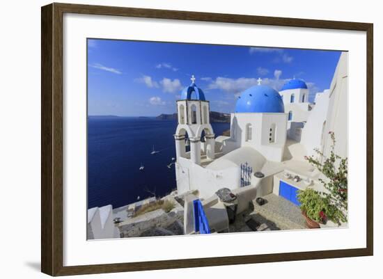 Blue Roofed Churches and Homes are Everywhere on the Island. Santorini. Greece-Tom Norring-Framed Photographic Print