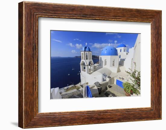 Blue Roofed Churches and Homes are Everywhere on the Island. Santorini. Greece-Tom Norring-Framed Photographic Print