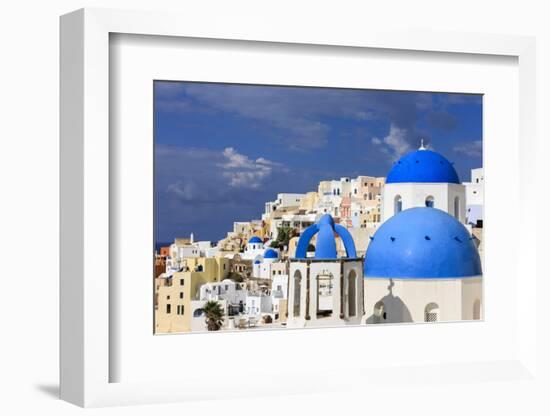 Blue Roofed Churches, Cities Embrace the Steep Mountain Sides, Santorini, Greece-Tom Norring-Framed Photographic Print