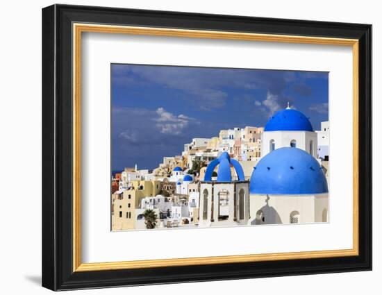 Blue Roofed Churches, Cities Embrace the Steep Mountain Sides, Santorini, Greece-Tom Norring-Framed Photographic Print