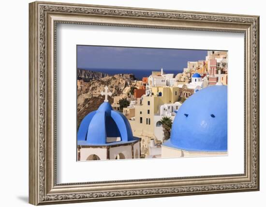 Blue Roofed Churches, Cities Embrace the Steep Mountain Sides, Santorini, Greece-Tom Norring-Framed Photographic Print