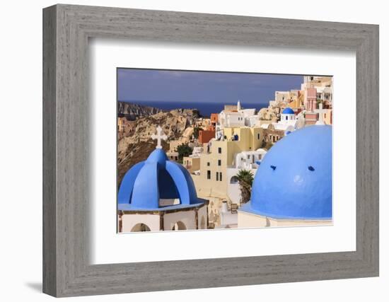 Blue Roofed Churches, Cities Embrace the Steep Mountain Sides, Santorini, Greece-Tom Norring-Framed Photographic Print