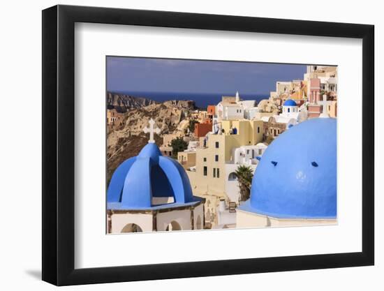 Blue Roofed Churches, Cities Embrace the Steep Mountain Sides, Santorini, Greece-Tom Norring-Framed Photographic Print