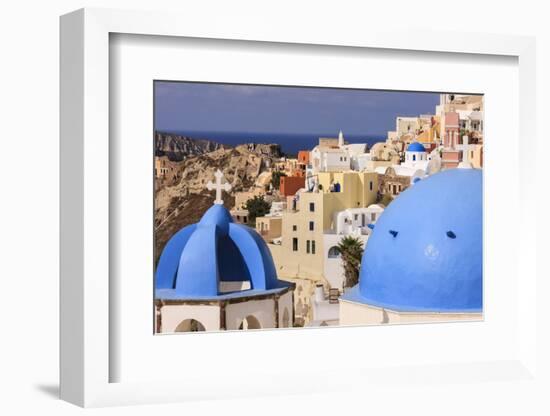 Blue Roofed Churches, Cities Embrace the Steep Mountain Sides, Santorini, Greece-Tom Norring-Framed Photographic Print