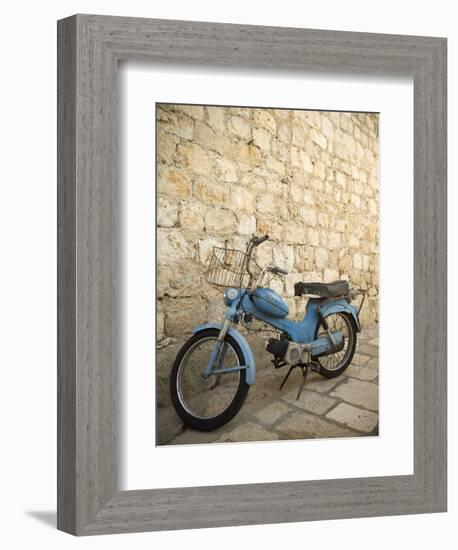 Blue scooter bike by old stone wall, Hvar Town, Hvar Island, Dalmatia, Croatia-Merrill Images-Framed Photographic Print