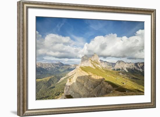 Blue sky and clouds on the rocky peaks of the Odle mountain range seen from Seceda, Val Gardena, Tr-Roberto Moiola-Framed Photographic Print