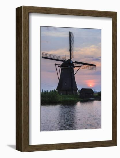 Blue Sky and Pink Clouds on the Windmill Reflected in the Canal at Dawn, Netherlands-Roberto Moiola-Framed Photographic Print