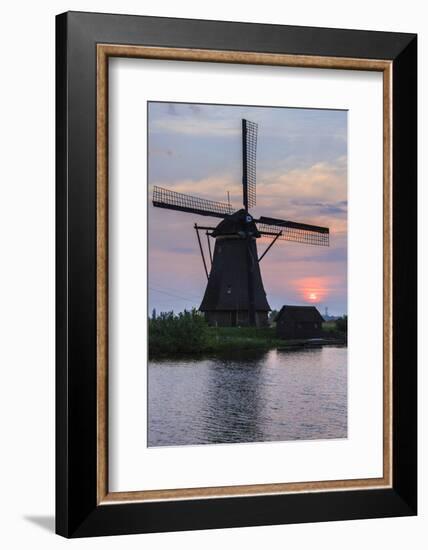Blue Sky and Pink Clouds on the Windmill Reflected in the Canal at Dawn, Netherlands-Roberto Moiola-Framed Photographic Print