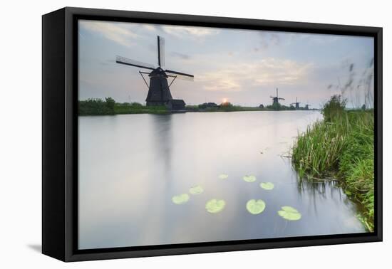 Blue Sky and Pink Clouds on the Windmills Reflected in the Canal at Dawn, Netherlands-Roberto Moiola-Framed Premier Image Canvas