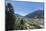 Blue sky and woods frame the alpine village of Pinzolo, Brenta Dolomites, Trentino-Alto Adige, Ital-Roberto Moiola-Mounted Photographic Print