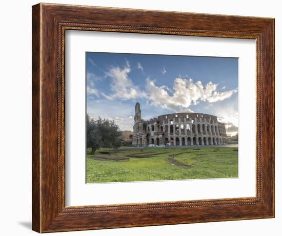 Blue sky at sunrise frames the ancient Colosseum (Flavian Amphitheatre), UNESCO World Heritage Site-Roberto Moiola-Framed Photographic Print