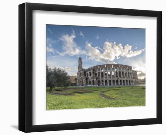 Blue sky at sunrise frames the ancient Colosseum (Flavian Amphitheatre), UNESCO World Heritage Site-Roberto Moiola-Framed Photographic Print