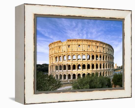 Blue sky at sunrise frames the ancient Colosseum (Flavian Amphitheatre), UNESCO World Heritage Site-Roberto Moiola-Framed Premier Image Canvas