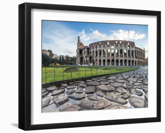 Blue sky at sunrise frames the ancient Colosseum (Flavian Amphitheatre), UNESCO World Heritage Site-Roberto Moiola-Framed Photographic Print