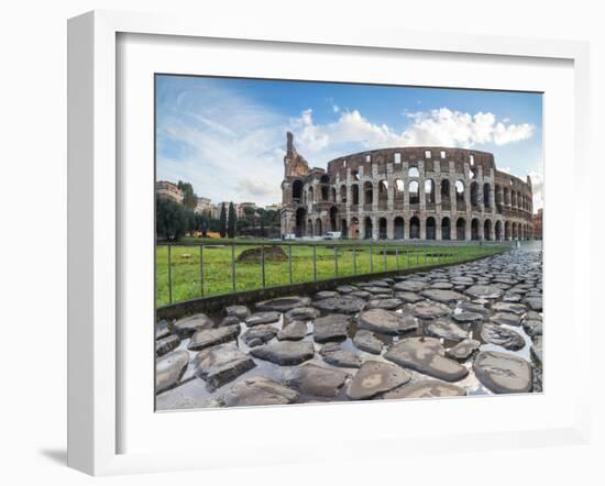 Blue sky at sunrise frames the ancient Colosseum (Flavian Amphitheatre), UNESCO World Heritage Site-Roberto Moiola-Framed Photographic Print