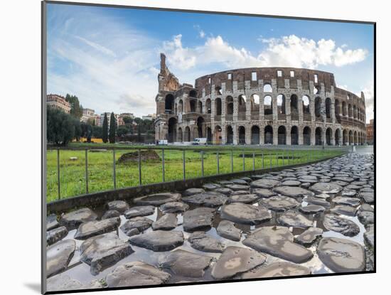 Blue sky at sunrise frames the ancient Colosseum (Flavian Amphitheatre), UNESCO World Heritage Site-Roberto Moiola-Mounted Photographic Print