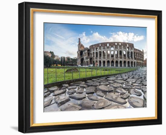 Blue sky at sunrise frames the ancient Colosseum (Flavian Amphitheatre), UNESCO World Heritage Site-Roberto Moiola-Framed Photographic Print