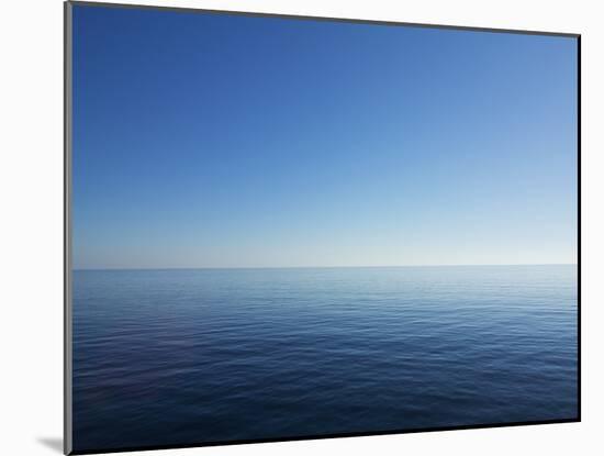 Blue Sky over Calm Sea-Norbert Schaefer-Mounted Photographic Print