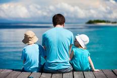 Back View of Father and Kids Sitting on Wooden Dock Looking to Ocean-BlueOrange Studio-Photographic Print