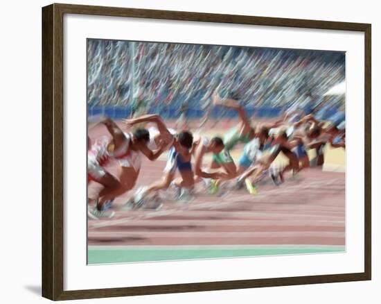 Blured Action at the Start of a Mens 100 Meter Track and Field Race-Paul Sutton-Framed Photographic Print