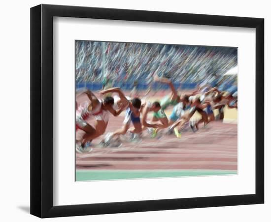 Blured Action at the Start of a Mens 100 Meter Track and Field Race-Paul Sutton-Framed Photographic Print