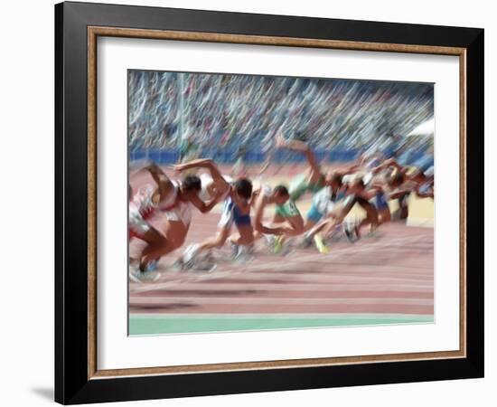 Blured Action at the Start of a Mens 100 Meter Track and Field Race-Paul Sutton-Framed Photographic Print